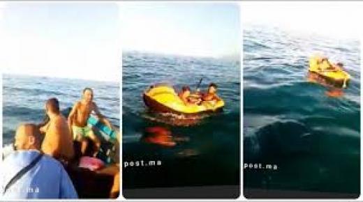 شاهد”فيديو” انقاذ طفلين مغربيين حاولا الهجرة بحرا في قارب مطاطي صغير..